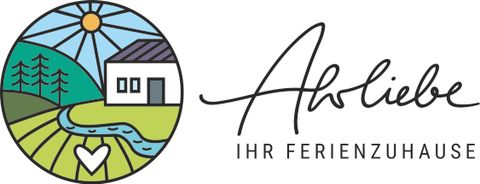 A stylized logo featuring a house in the landscape, surrounded by trees and a river. The sun shines over the rural scene, and it bears the inscription "AbLiebe – Your Holiday Home."