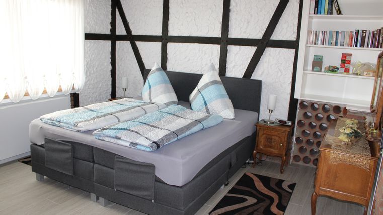 Double room with box spring bed
