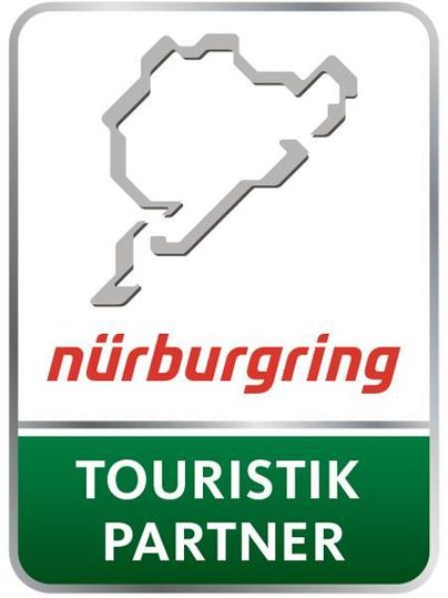 A logo of the Nürburgring that shows a stylized track. Below it is "Touristik Partner" in clear lettering.