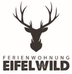 Ein stilisiertes Geweih eines Rehes ist abgebildet. Darunter steht der Schriftzug "Ferienwohnung Eifelwild".