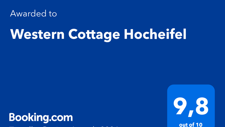 Eine Auszeichnung für das Western Cottage Hochaus. Es erhält eine Bewertung von 9,8 von 10 von Booking.com im Jahr 2026.